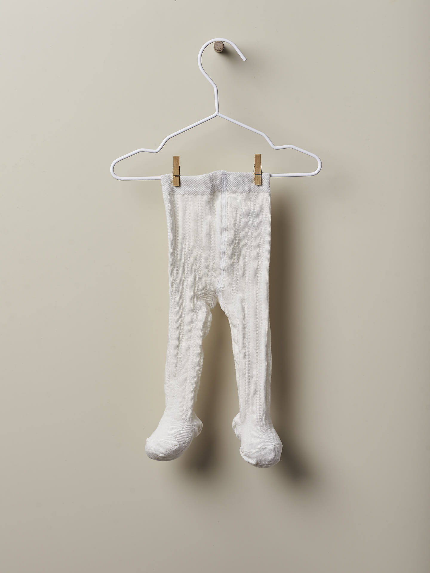 Collants de malha com design crochet